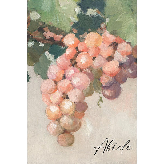 Close-up of grapes and vine leaves in soft neutral and vibrant tones