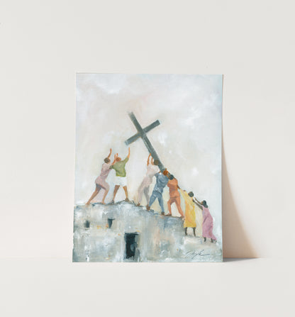 Vibrant Christian wall art of people from different backgrounds raising the cross together on a ruined building, symbolizing the global church, persecution, unity, and hope in Christ.