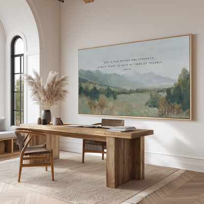 Peaceful mountain landscape art with Bible verse God our Refuge and Strength in a contemporary style office