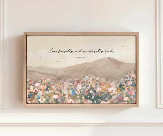 Christian wall art featuring wildflowers in a sunlit field and birds in the open sky with the Scripture quote “Fearfully and wonderfully made” from Psalm 139.