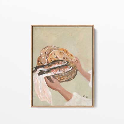 A framed canvas painting of Five and Two depicting hands presenting a basket of five loaves and two fish before Jesus feeds the multitude