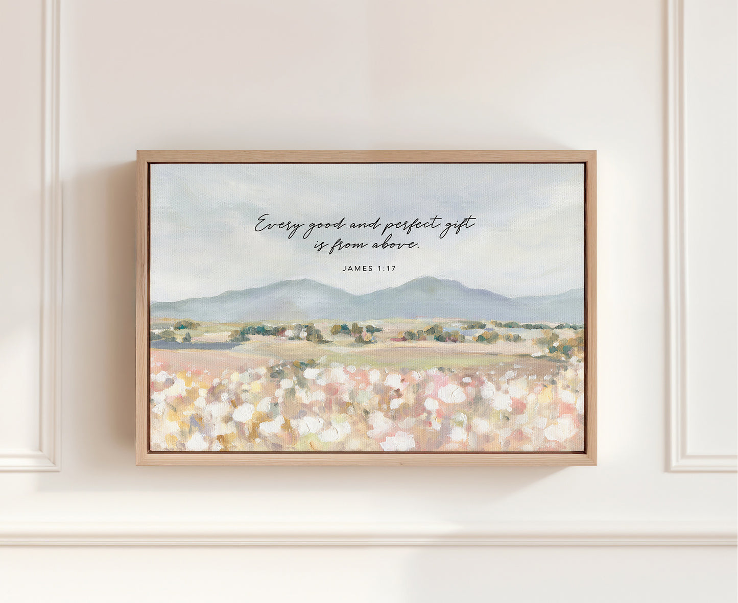 Framed canvas Christian art of Floral field landscape wall art with mountains in the distance featuring James 1:17 Scripture