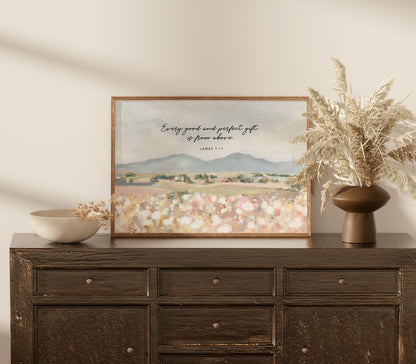 Framed Christian art of Floral field landscape wall art with mountains in the distance featuring James 1:17 Scripture