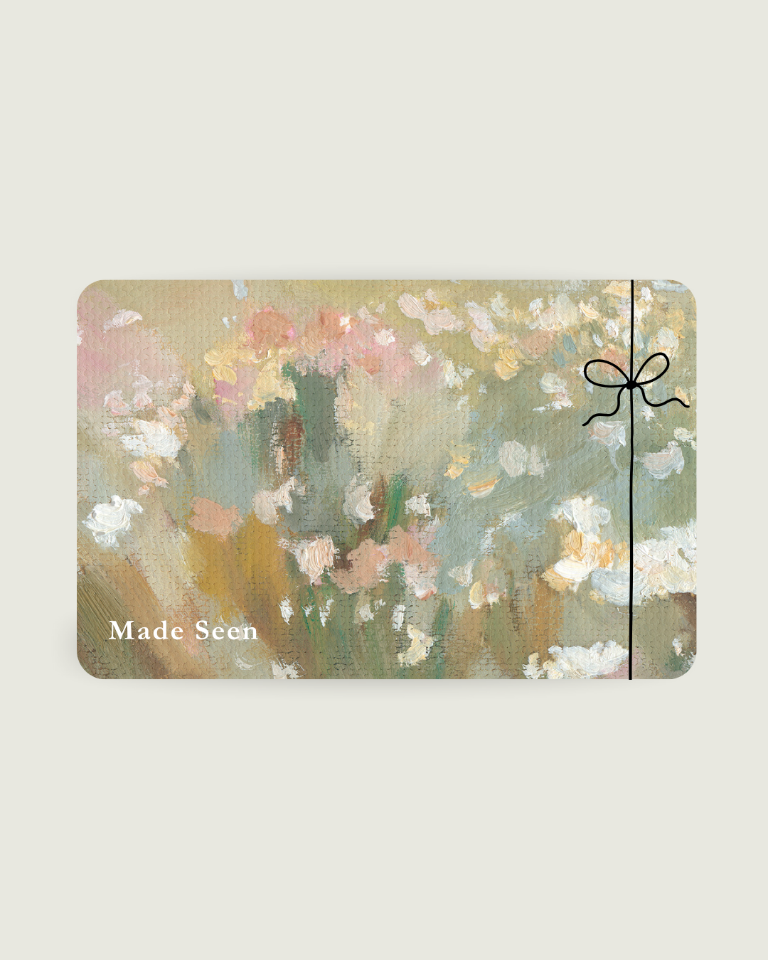 Gift card with floral design and 'Made Seen' branding on a light background