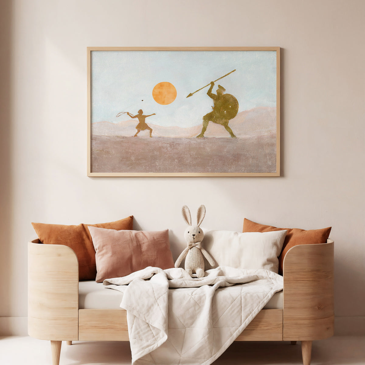 A wood framed art print depicting a stylized ancient battle scene of David and Goliath  -young David releasing a sling stone toward the armored giant beneath an orange sun.