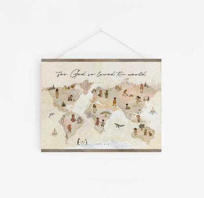 A rectangular wall hanging print with a watercolor-style world map, small illustrated figures, and the text 'For God we earned the world' at the top, suspended by a thin cord against a plain white wall.