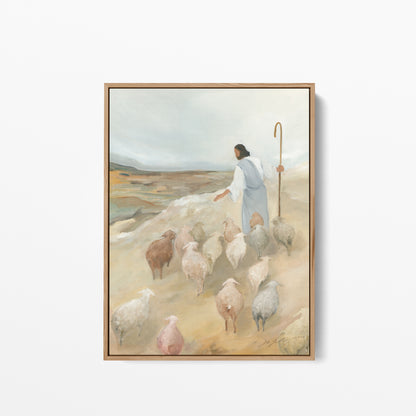 Jesus the Good Shepherd wall art in a natural wood frame, depicting Christ leading a flock of sheep.