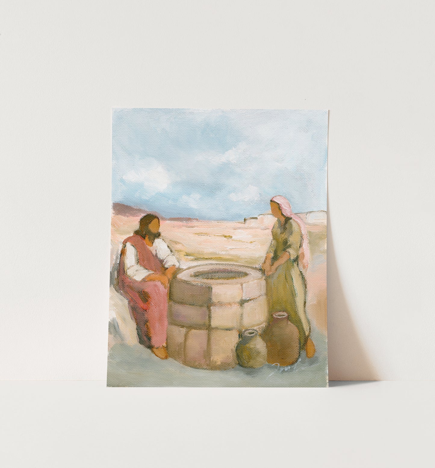 Unframed Known at the Well art print showing Jesus speaking with the Samaritan woman, displayed against a white wall.