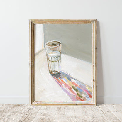 Framed art print of a Painting of a glass of water casting a long colorful shadow, with Matthew 10:42 written beside it.